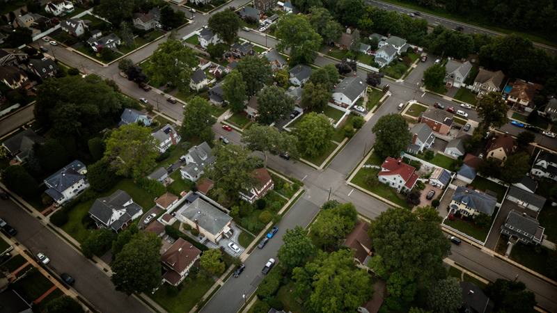 Aerial view of an older, tree-lined residential street grid