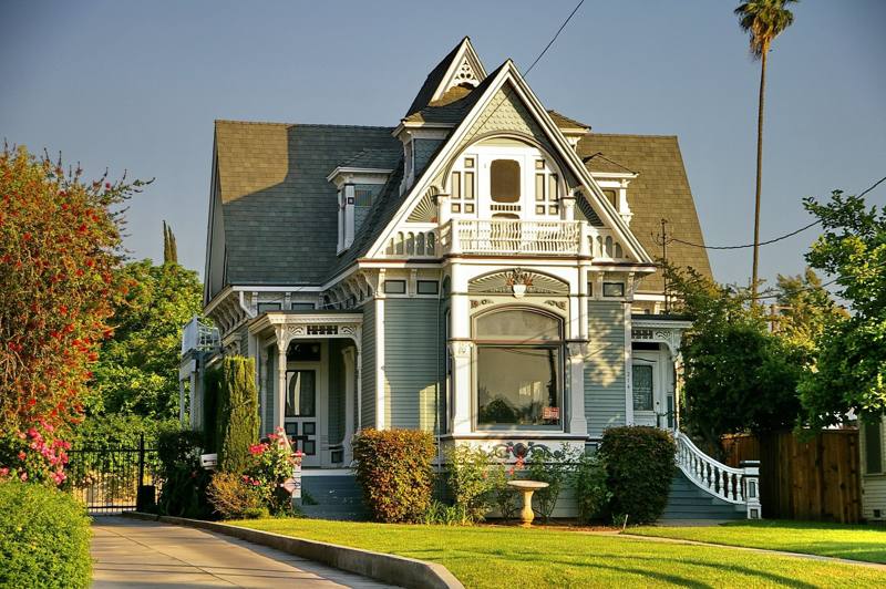 Victorian-era house with a wraparound porch